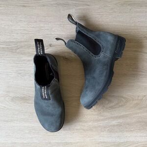 Rustic black high top blundstone boots